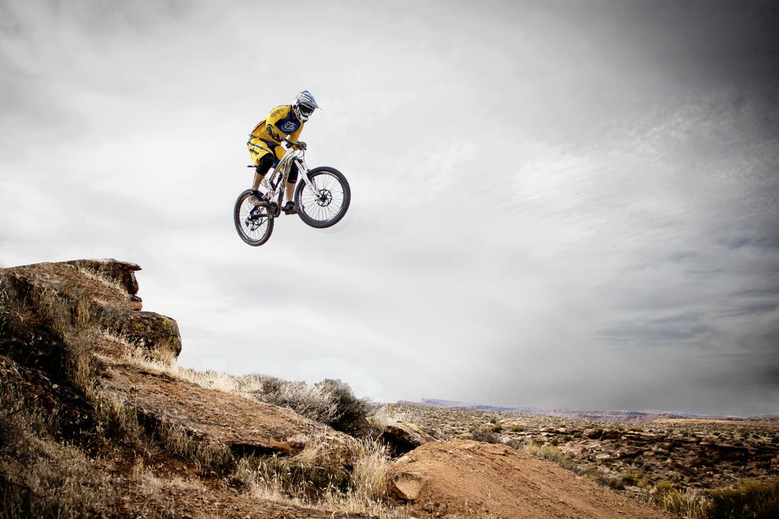 riding a bike in a hill