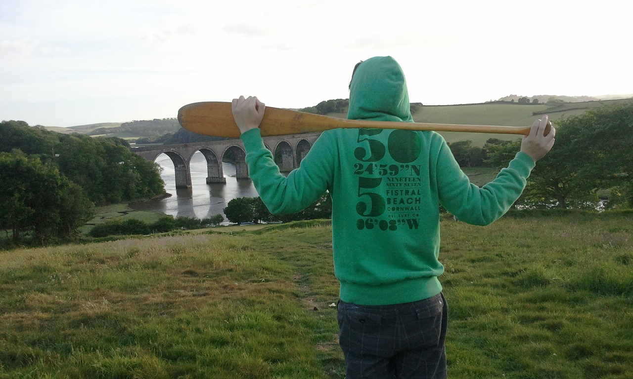 holding a paddle